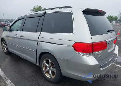 2009 Honda Odyssey Touring z USA, uszkodzony, nr VIN 5FNRL38859B029714